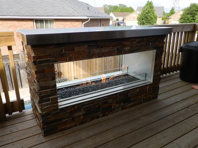 A fireplace installation by The One Stop Fireplace Shop in the Niagara Peninsula