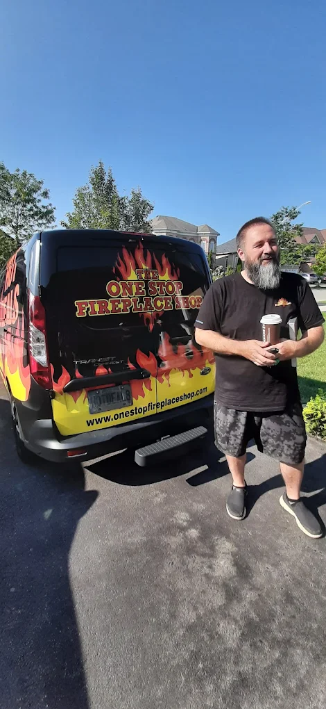 A One Stop Fireplace Shop service team member with the company van in Niagara Falls